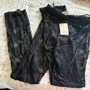 Lace flared cropped pants Never